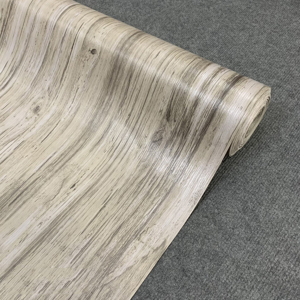 Thảm nhựa trải sàn vân gỗ - simili trải sàn vân gỗ chất liệu dày đẹp, dai và rất bền, có thể trải sàn nhà và lót mặt bàn tủ đều được.